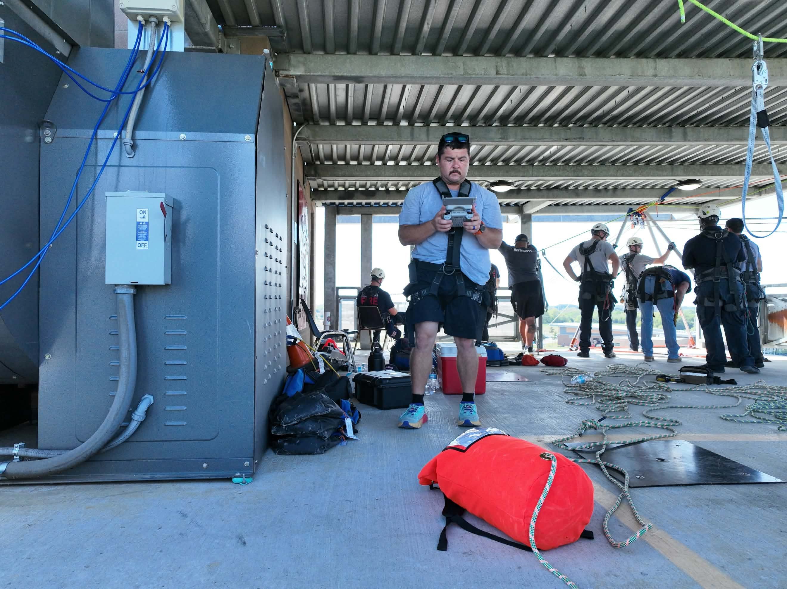 Tony flying at a rope rescue training